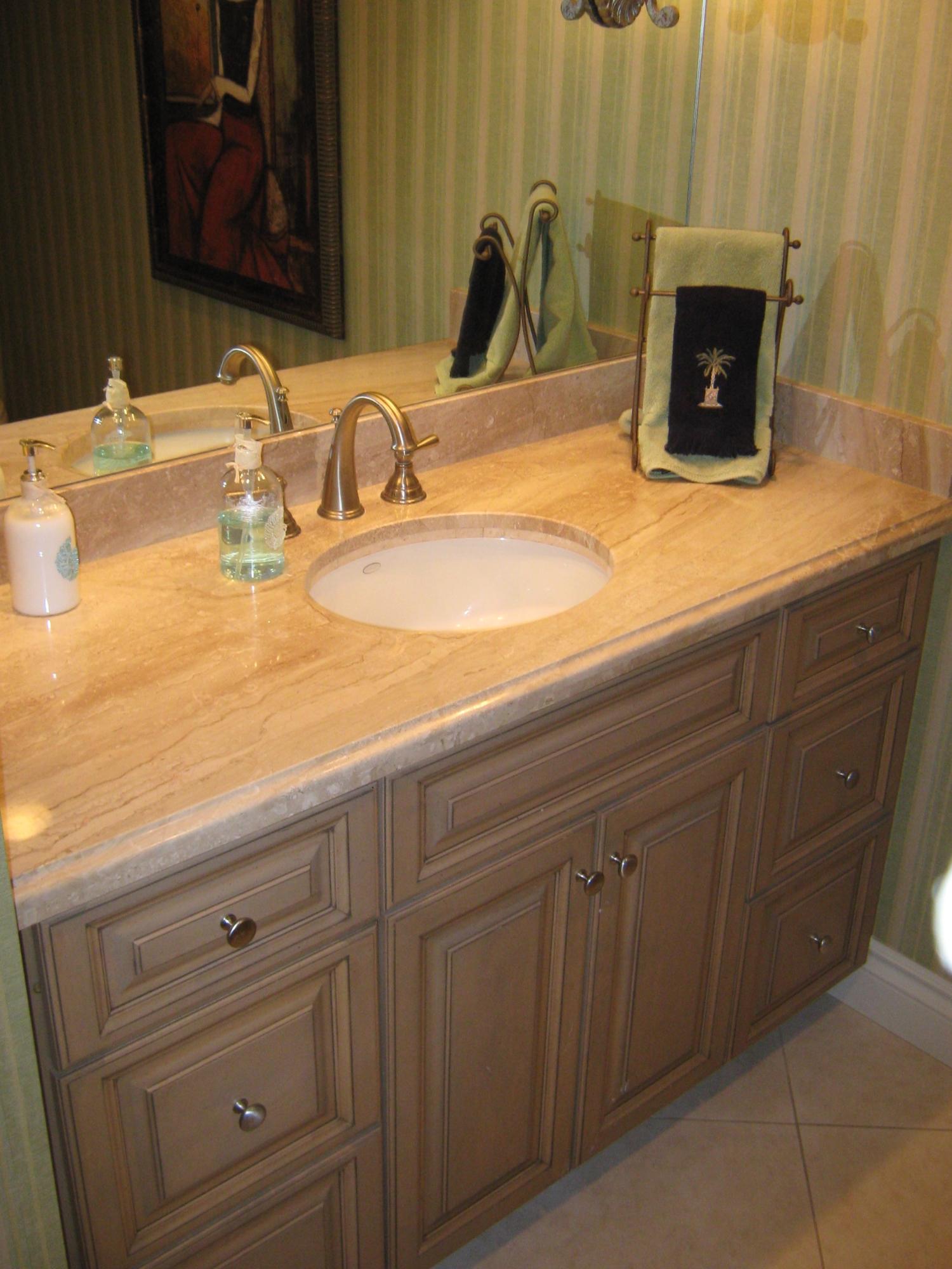19670 South Beach Road, Unit PHB4 Jupiter, FL 33469 - Photo 29 of 35 a bathroom with a sink and a mirror