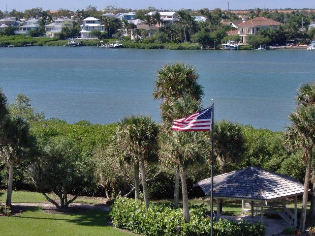 19670 South Beach Road, Unit PHB4 Jupiter, FL 33469 - Photo 4 of 35 an aerial view of lake and green space