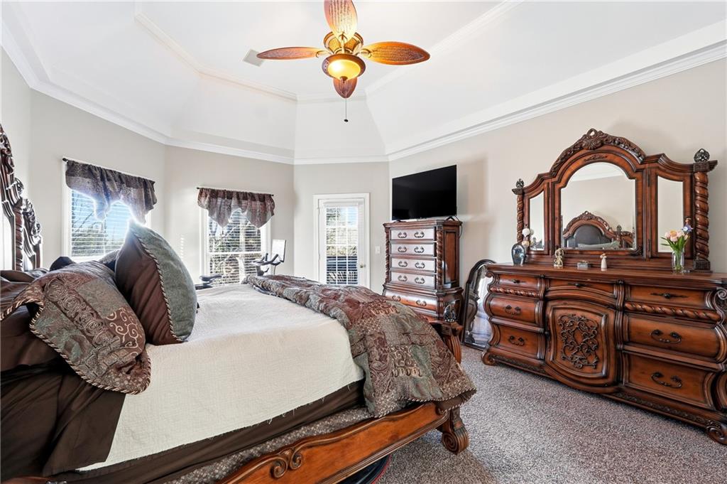 585 Tilbury Drive Suwanee, GA 30024 - Photo 20 of 46 a bed room with a bed and a television