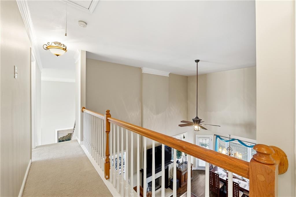 585 Tilbury Drive Suwanee, GA 30024 - Photo 29 of 46 a view of a hallway with staircase