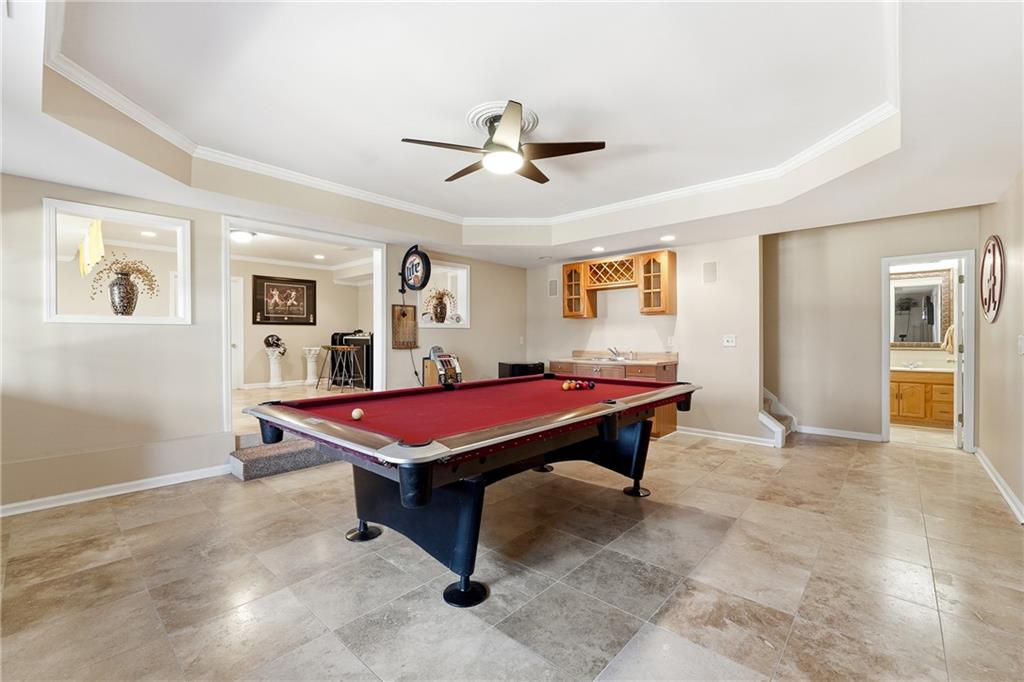 585 Tilbury Drive Suwanee, GA 30024 - Photo 32 of 46 a room with pool table and windows