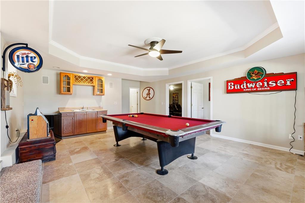 585 Tilbury Drive Suwanee, GA 30024 - Photo 33 of 46 a room with furniture pool table and ceiling fan