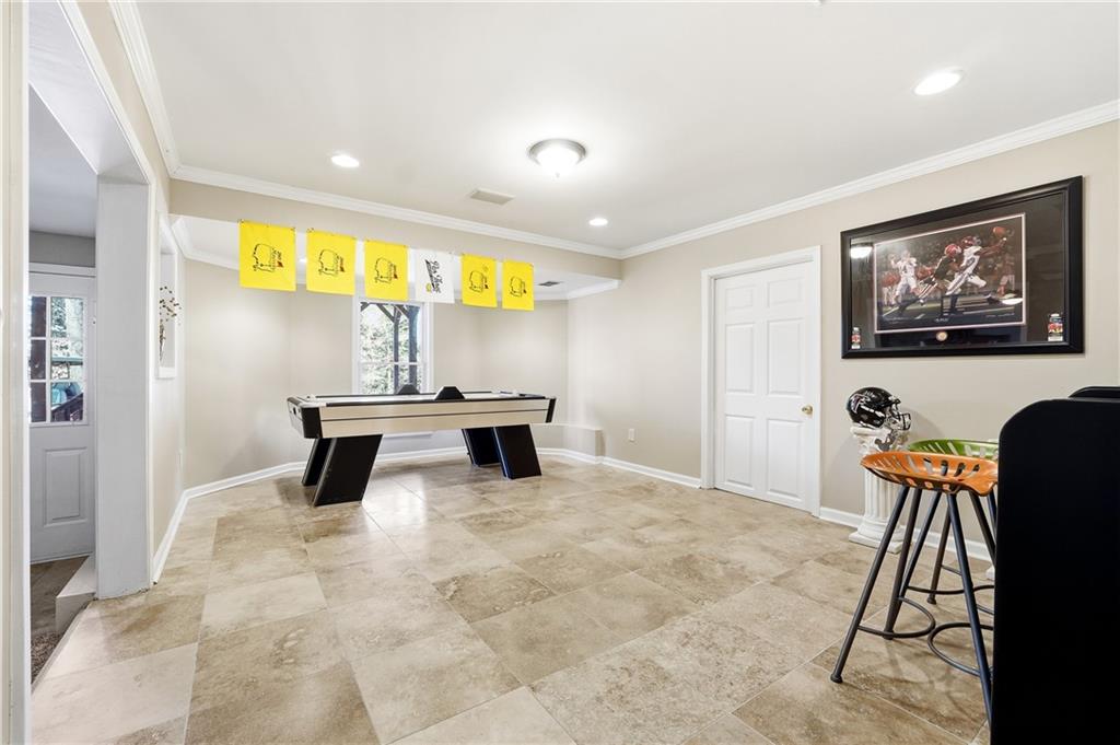 585 Tilbury Drive Suwanee, GA 30024 - Photo 34 of 46 a view of kitchen with furniture and window