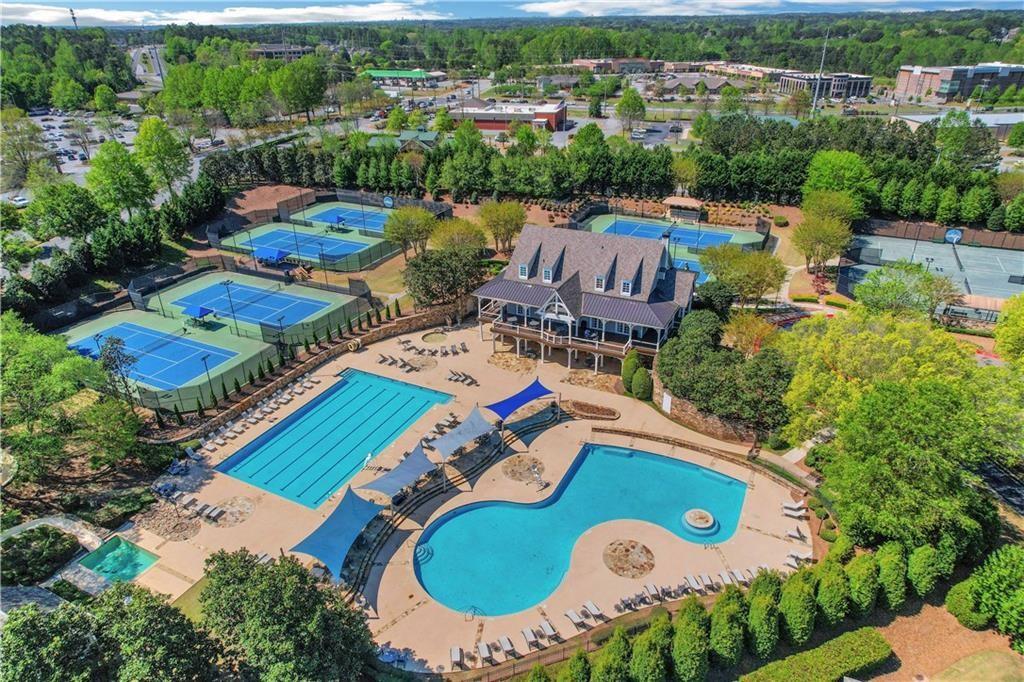 585 Tilbury Drive Suwanee, GA 30024 - Photo 46 of 46 an aerial view of a house a swimming pool yard and outdoor seating
