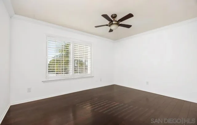a bathroom with a sink double vanity granite tub shower and a mirror