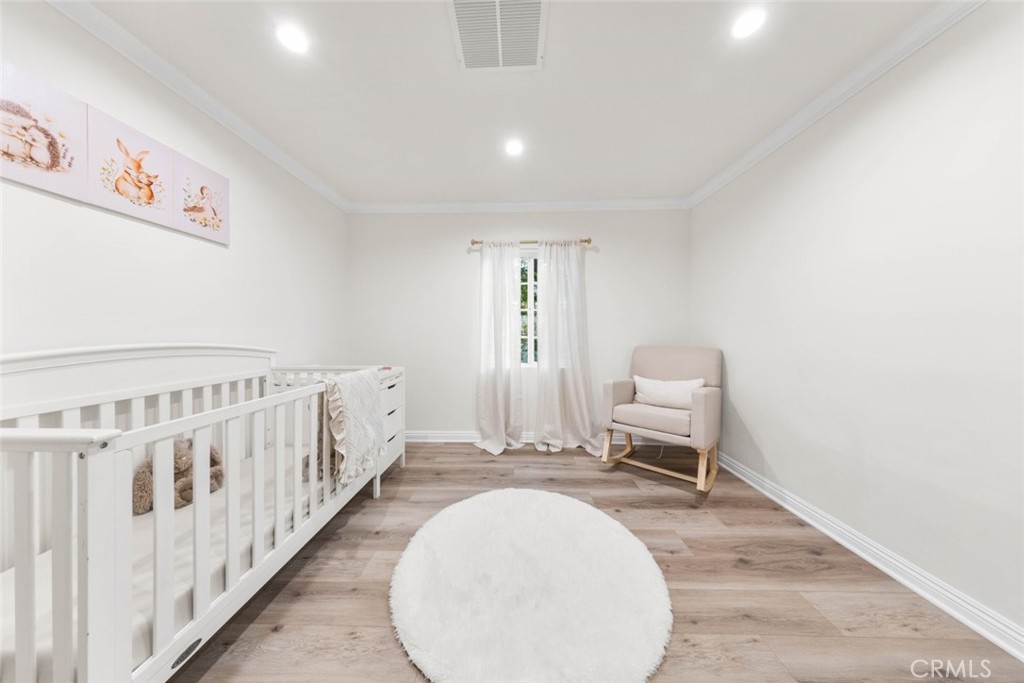 10554 Plainview Avenue Tujunga, CA 91042 - Photo 27 of 56 a living room with white walls and furniture