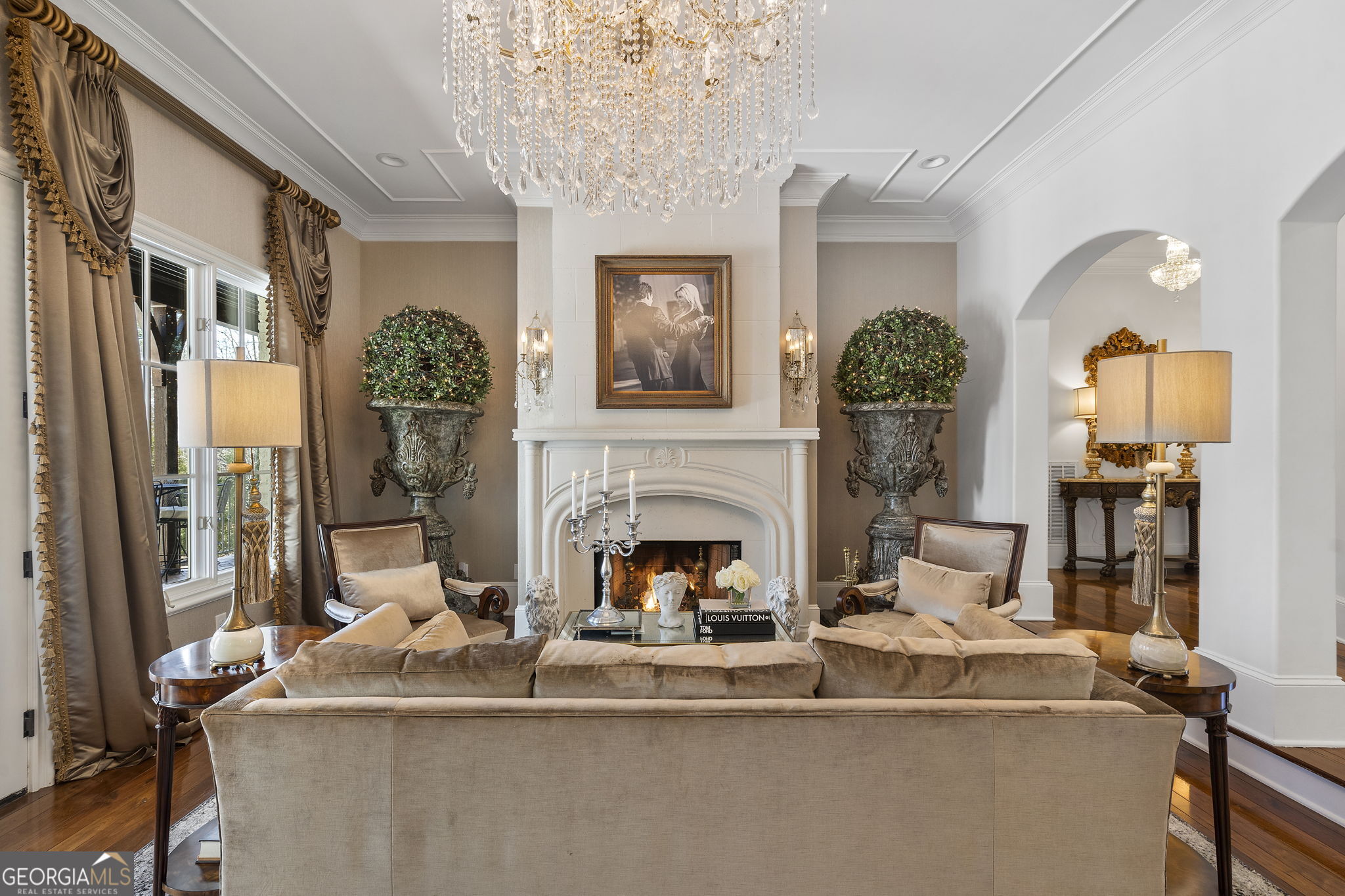 9 Belle Meade Drive Rome, GA 30165 - Photo 14 of 78 a living room with furniture a fireplace and a chandelier