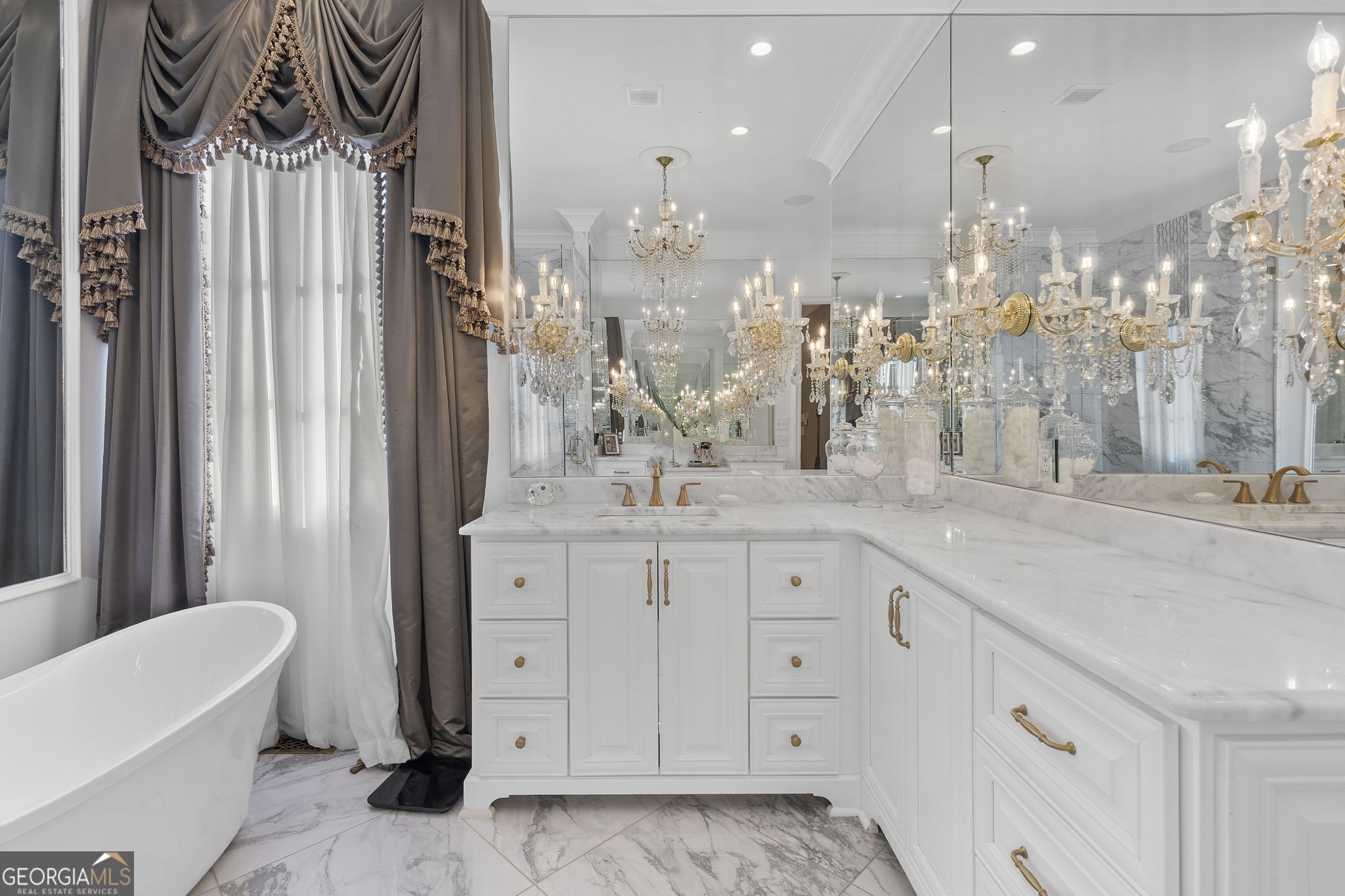 9 Belle Meade Drive Rome, GA 30165 - Photo 27 of 78 a bathroom with a sink a vanity a mirror and a bath tub
