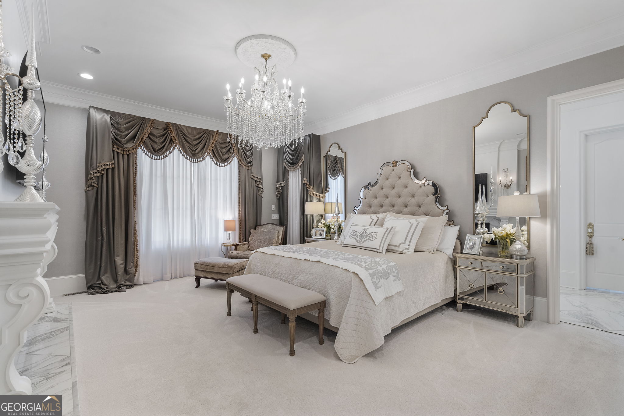 9 Belle Meade Drive Rome, GA 30165 - Photo 31 of 78 a bedroom with bed and a chandelier