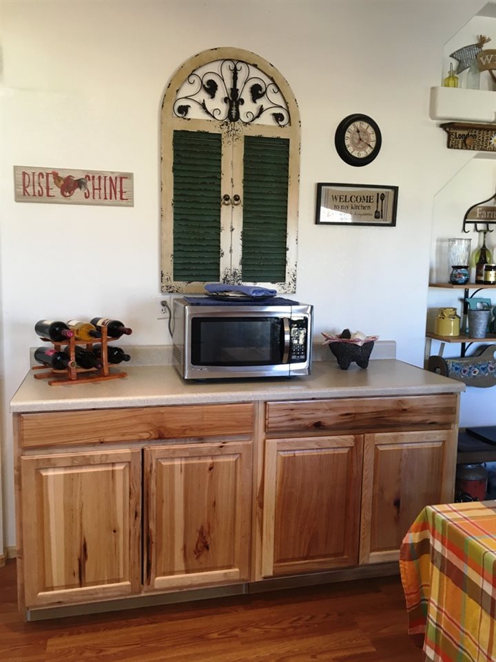 3708 2000 Road Delta, CO 81416 - Photo 11 of 42 a kitchen with a stove and a microwave