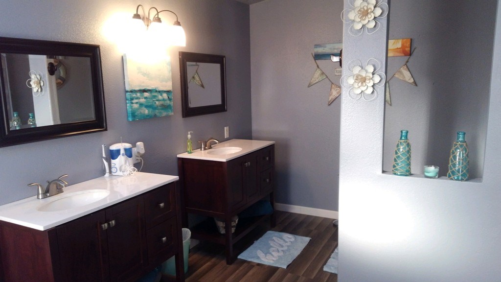 3708 2000 Road Delta, CO 81416 - Photo 26 of 42 a bathroom with a sink vanity and mirror
