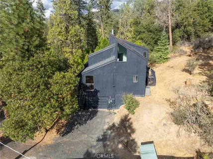 a view of balcony with wooden floor