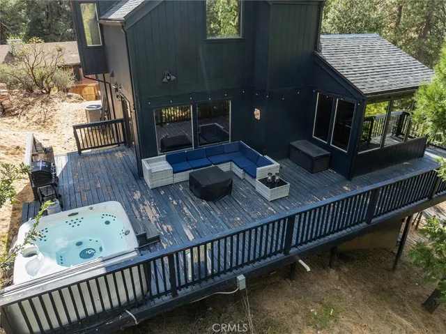 an aerial view of residential house with outdoor space