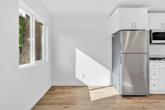 a bathroom with a sink and vanity