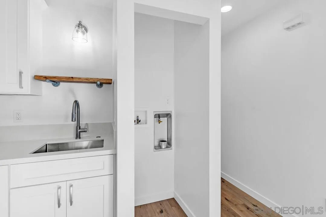 4922 Muir Avenue San Diego, CA 92107 - Photo 26 of 69 a bathroom with a sink and vanity