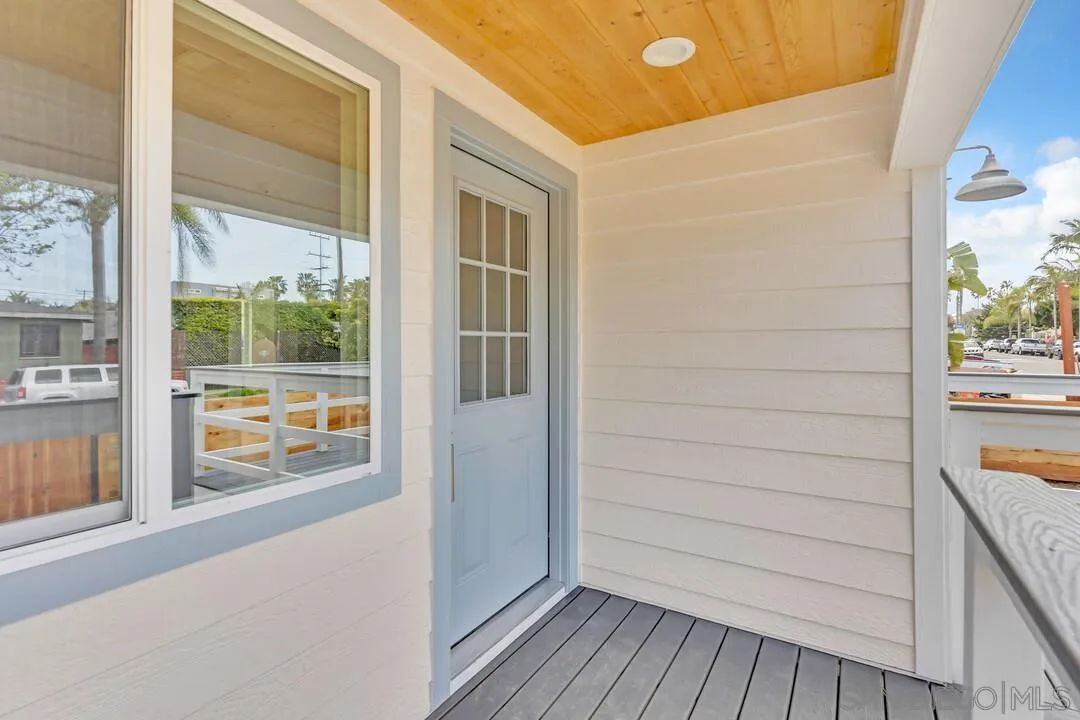 4922 Muir Avenue San Diego, CA 92107 - Photo 4 of 69 a view of front door and wooden floor