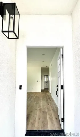 an aerial view of a house with a yard and potted plants