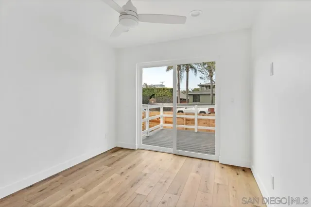 a bathroom with a shower and a toilet