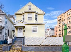 463 Bronx River Road Yonkers, NY 10704 - Photo 1 of 1 a front view of a house with a yard