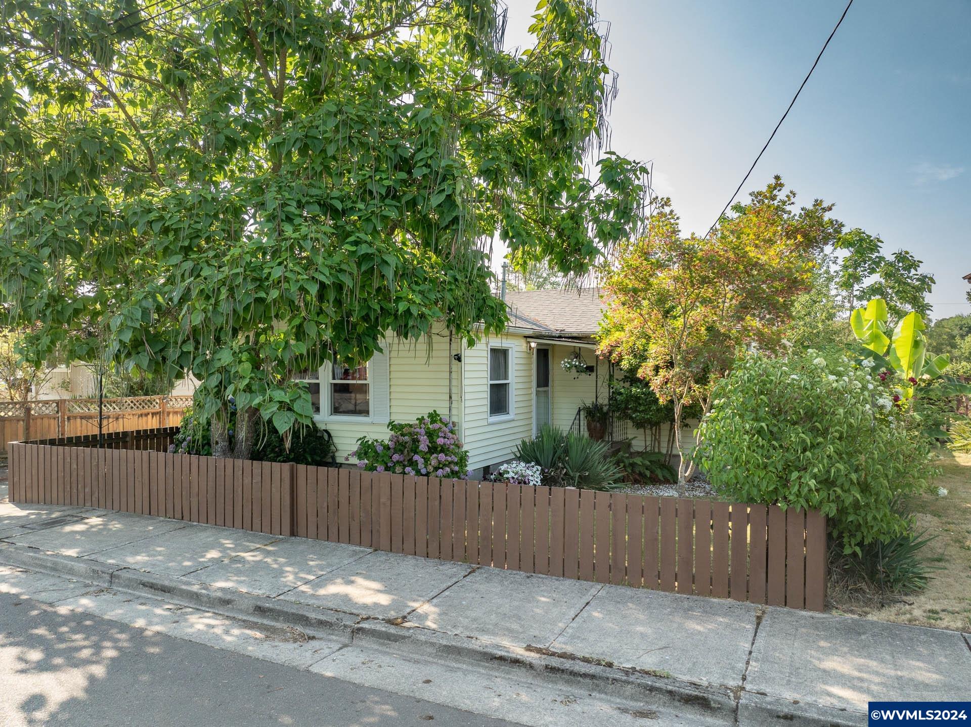 1530 2nd Avenue Albany, OR 97321 - Photo 2 of 35 a view of a house with a tree in front of it