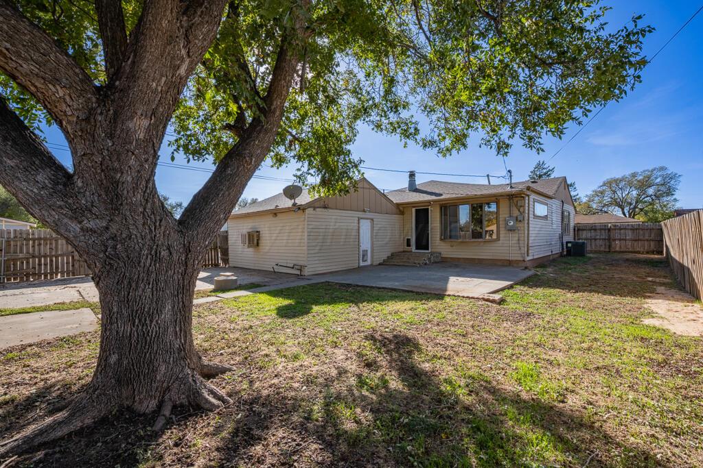 4319 South Lipscomb Street Amarillo, TX 79110 - Photo 12 of 28 a house with trees in front of it
