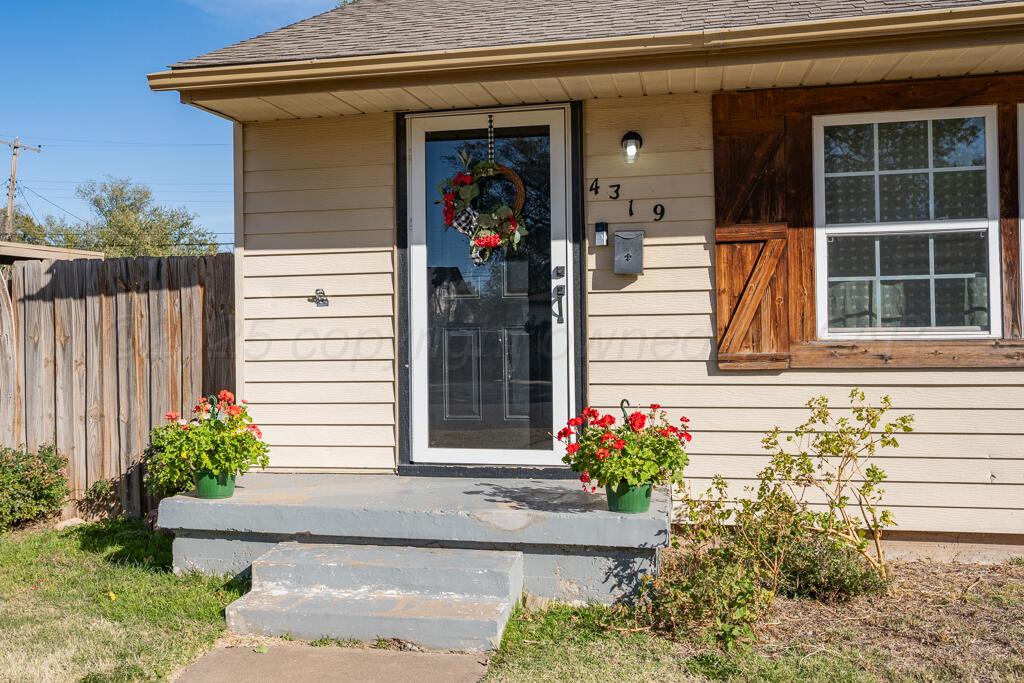4319 South Lipscomb Street Amarillo, TX 79110 - Photo 15 of 28 a front view of a house with a yard