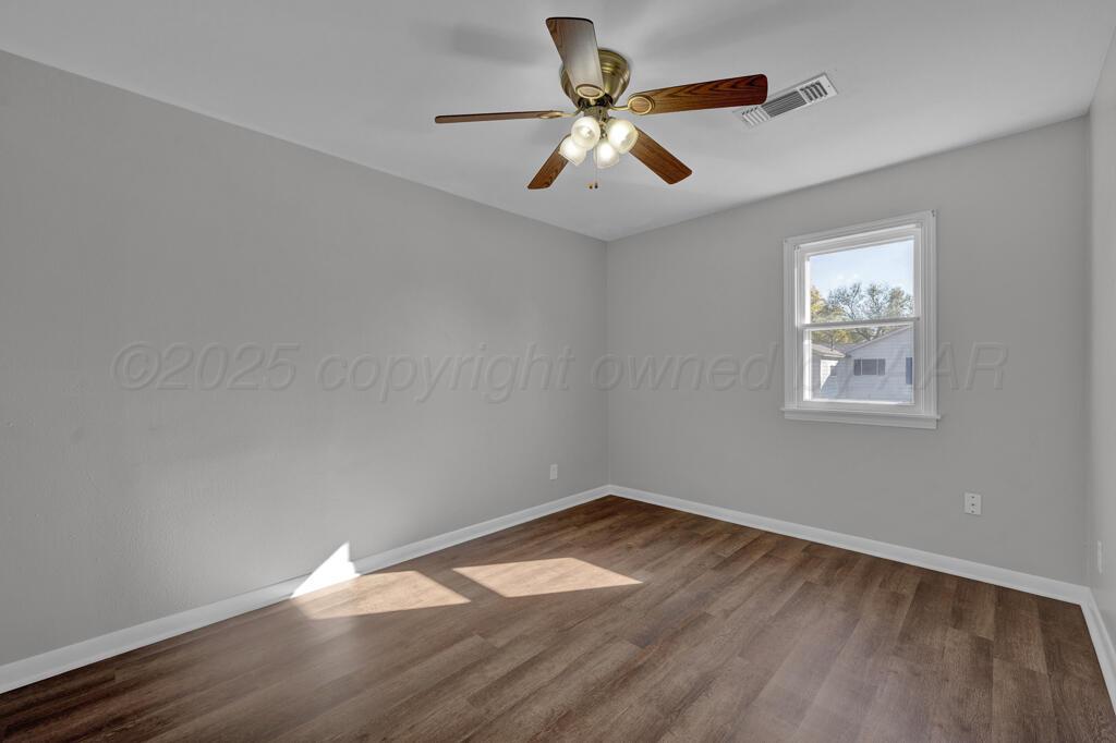 4319 South Lipscomb Street Amarillo, TX 79110 - Photo 10 of 28 a view of empty room with wooden floor