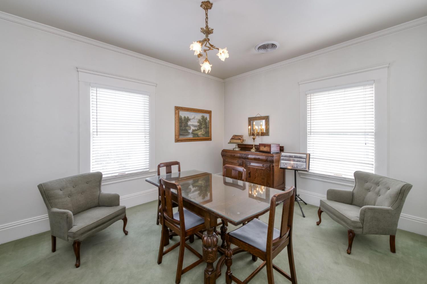 916 East Divisadero Street Fresno, CA 93721 - Photo 15 of 23 a view of a dining room with furniture and a window