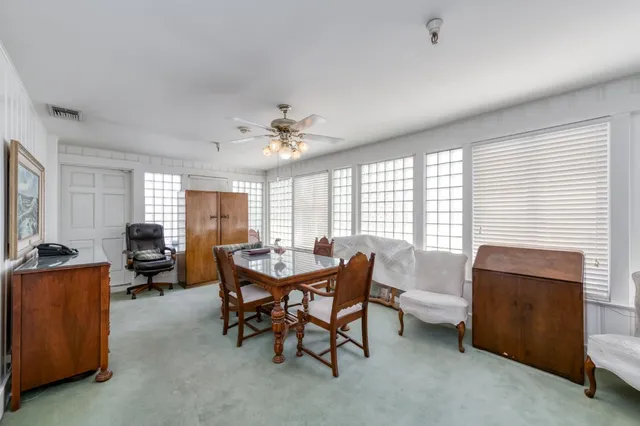 a view of a dining room with furniture