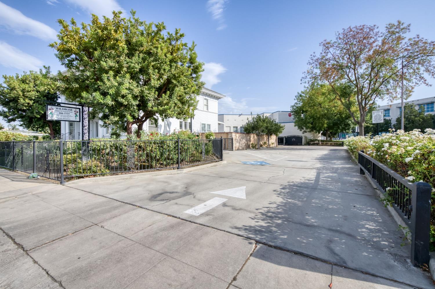 916 East Divisadero Street Fresno, CA 93721 - Photo 6 of 23 a sidewalk with a trees in front of it