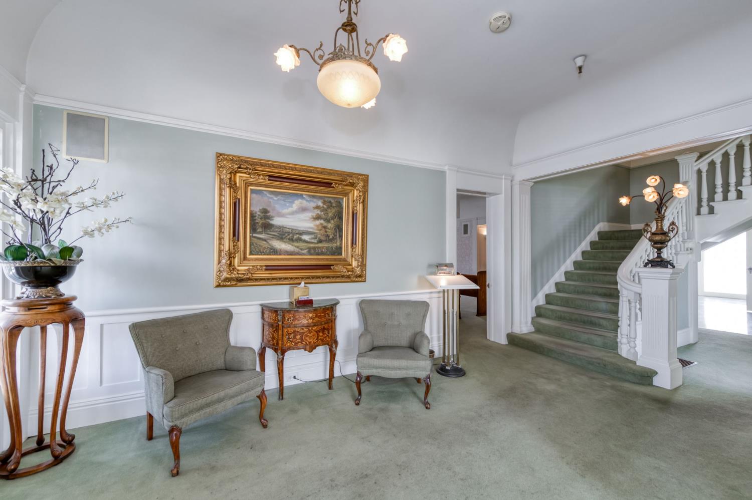 916 East Divisadero Street Fresno, CA 93721 - Photo 10 of 23 a view of a livingroom with furniture and a potted plant