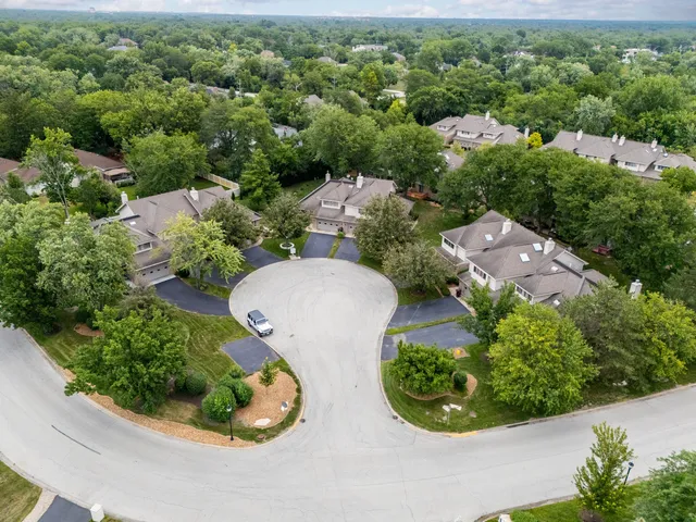 an aerial view of a city with lots of residential buildings