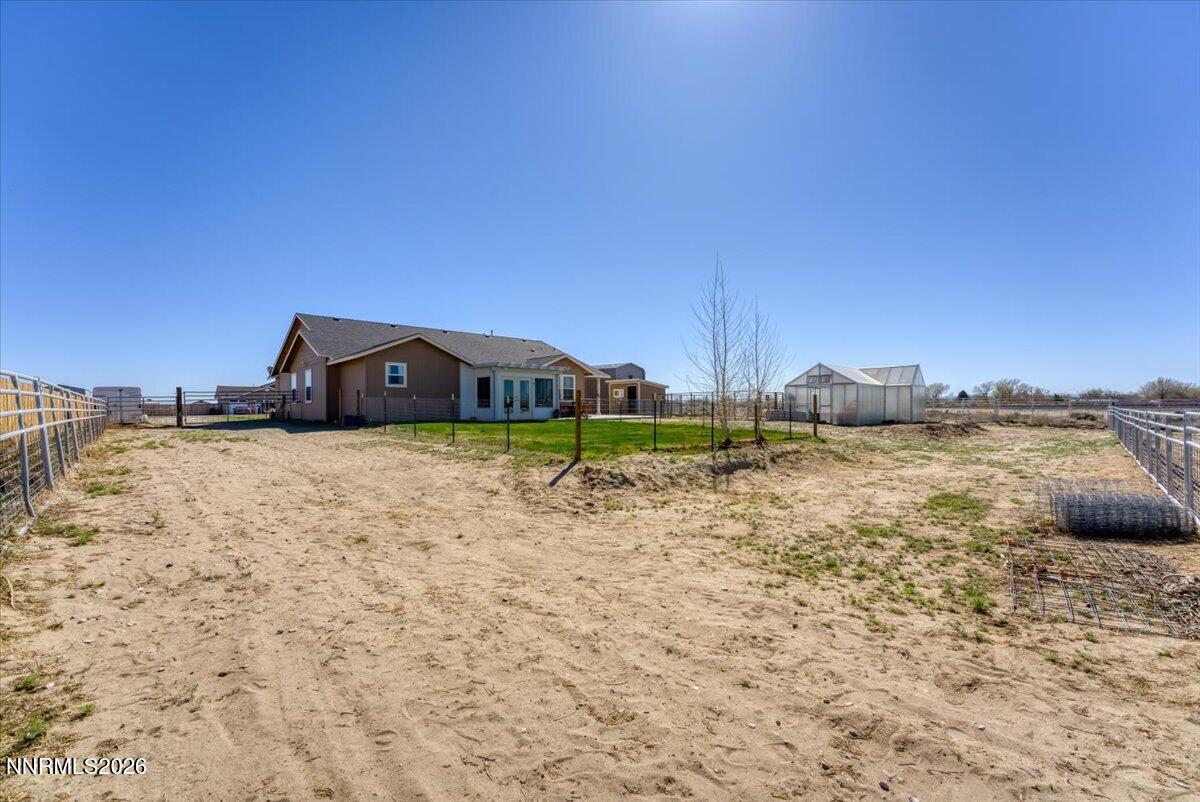 1197 Sky Ridge Drive Fallon, NV 89406 - Photo 51 of 79 a view of a house with a yard