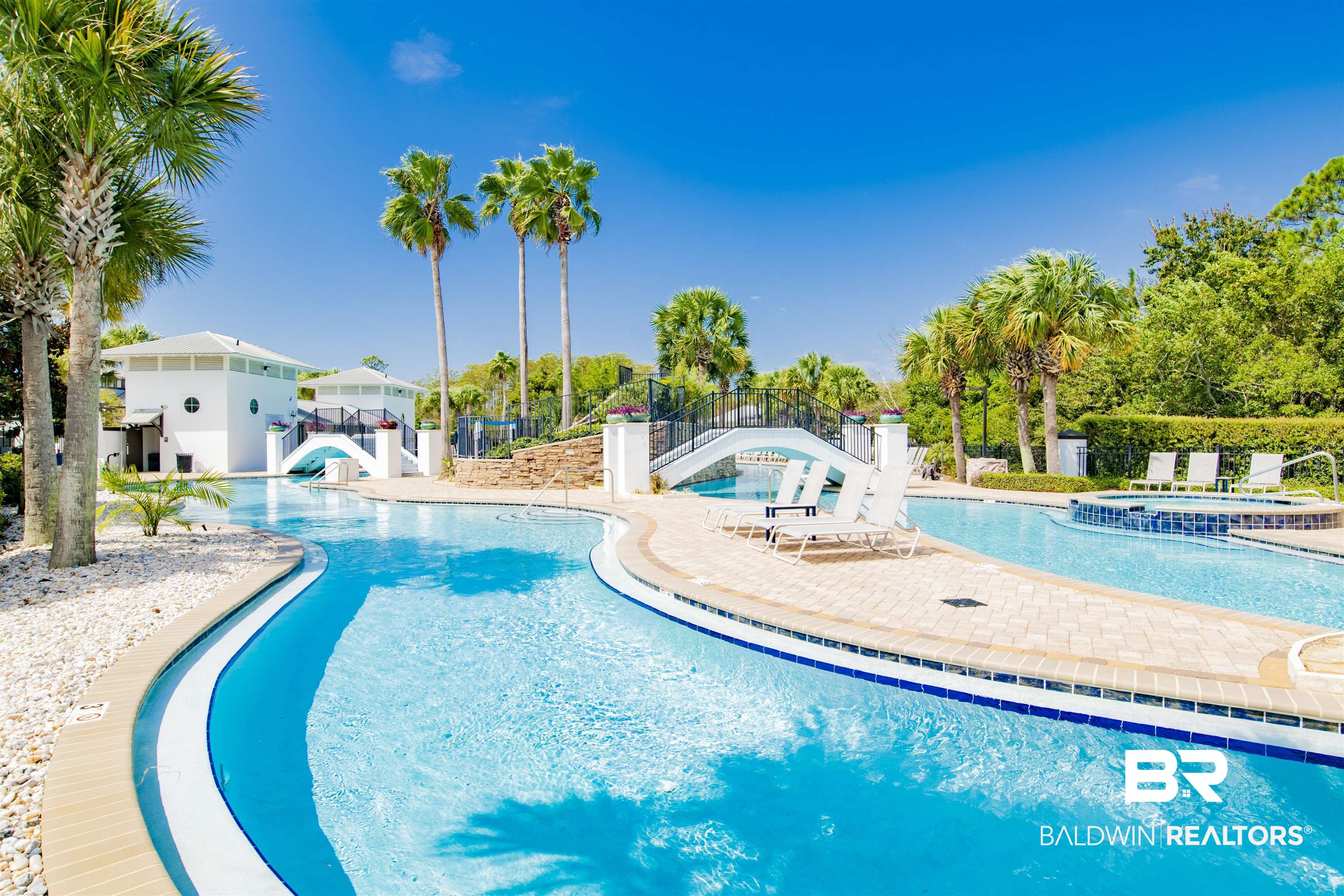 23893 Cypress Crossing Orange Beach, AL 36561 - Photo 19 of 22 Community pool with an in-ground hot tub, a patio, and a water slide