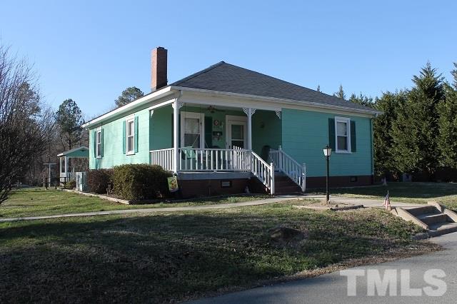 419 Edgar Street Roxboro, NC 27573 - Photo 1 of 18 a front view of a house with a yard