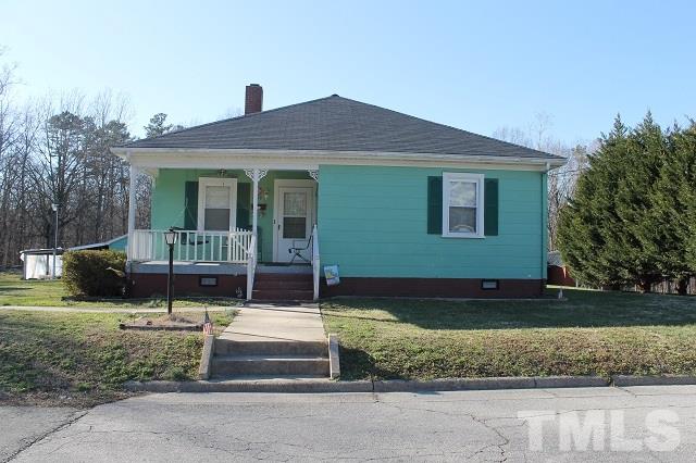 419 Edgar Street Roxboro, NC 27573 - Photo 2 of 18 a front view of a house with a yard