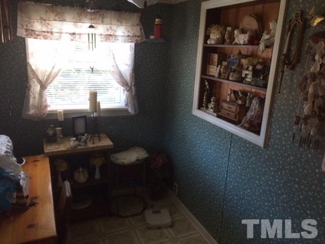 419 Edgar Street Roxboro, NC 27573 - Photo 17 of 18 a room with workbench and window