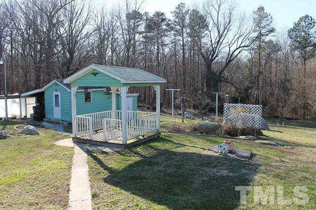 419 Edgar Street Roxboro, NC 27573 - Photo 5 of 18 a view of a house with yard and sitting area