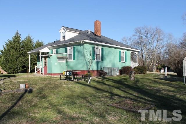 419 Edgar Street Roxboro, NC 27573 - Photo 8 of 18 a front view of a house with garden