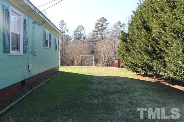 419 Edgar Street Roxboro, NC 27573 - Photo 10 of 18 a view of swimming pool with a yard