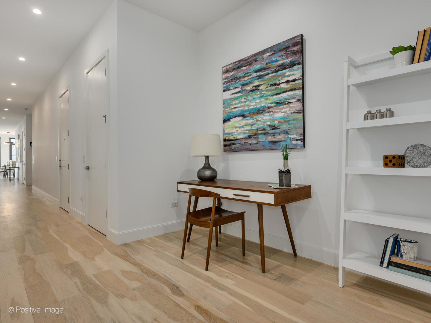 39 North Aberdeen Street, Unit 4S Chicago, IL 60607 - Photo 15 of 25 a workspace with furniture and a wooden floor