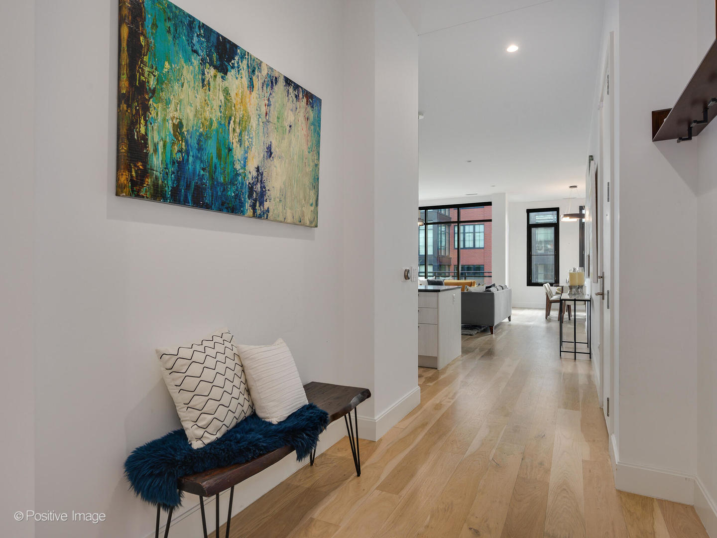 39 North Aberdeen Street, Unit 4S Chicago, IL 60607 - Photo 3 of 25 a living room with furniture and a wooden floor