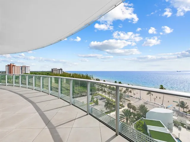 a view of balcony with furniture