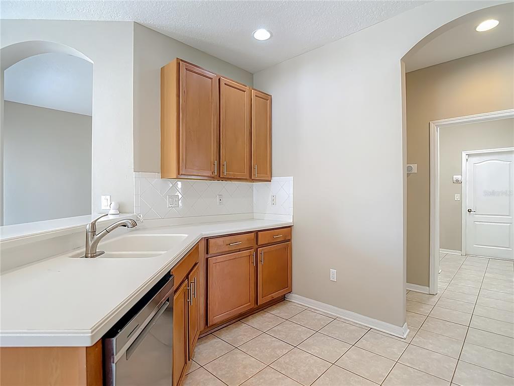 8942 Sandusky Lane New Port Richey, FL 34654 - Photo 19 of 87 a bathroom with a sink and a mirror