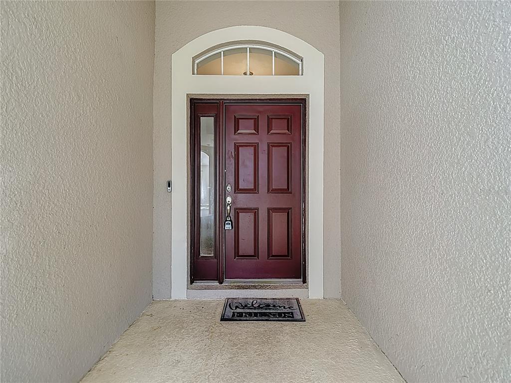 8942 Sandusky Lane New Port Richey, FL 34654 - Photo 4 of 87 a view of front door