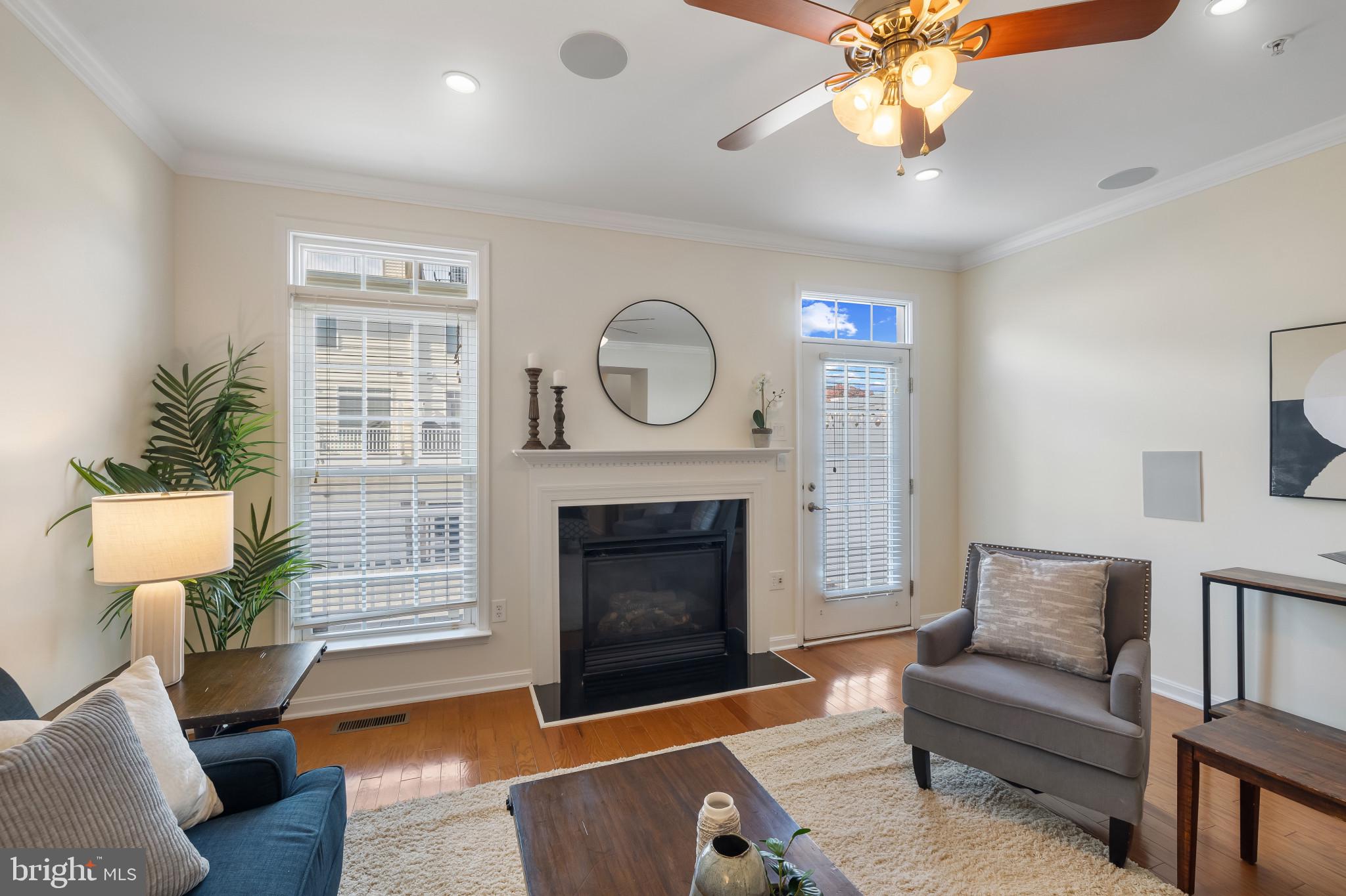 608 South Glover Street Baltimore, MD 21224 - Photo 19 of 41 Living room w/ gas fireplace