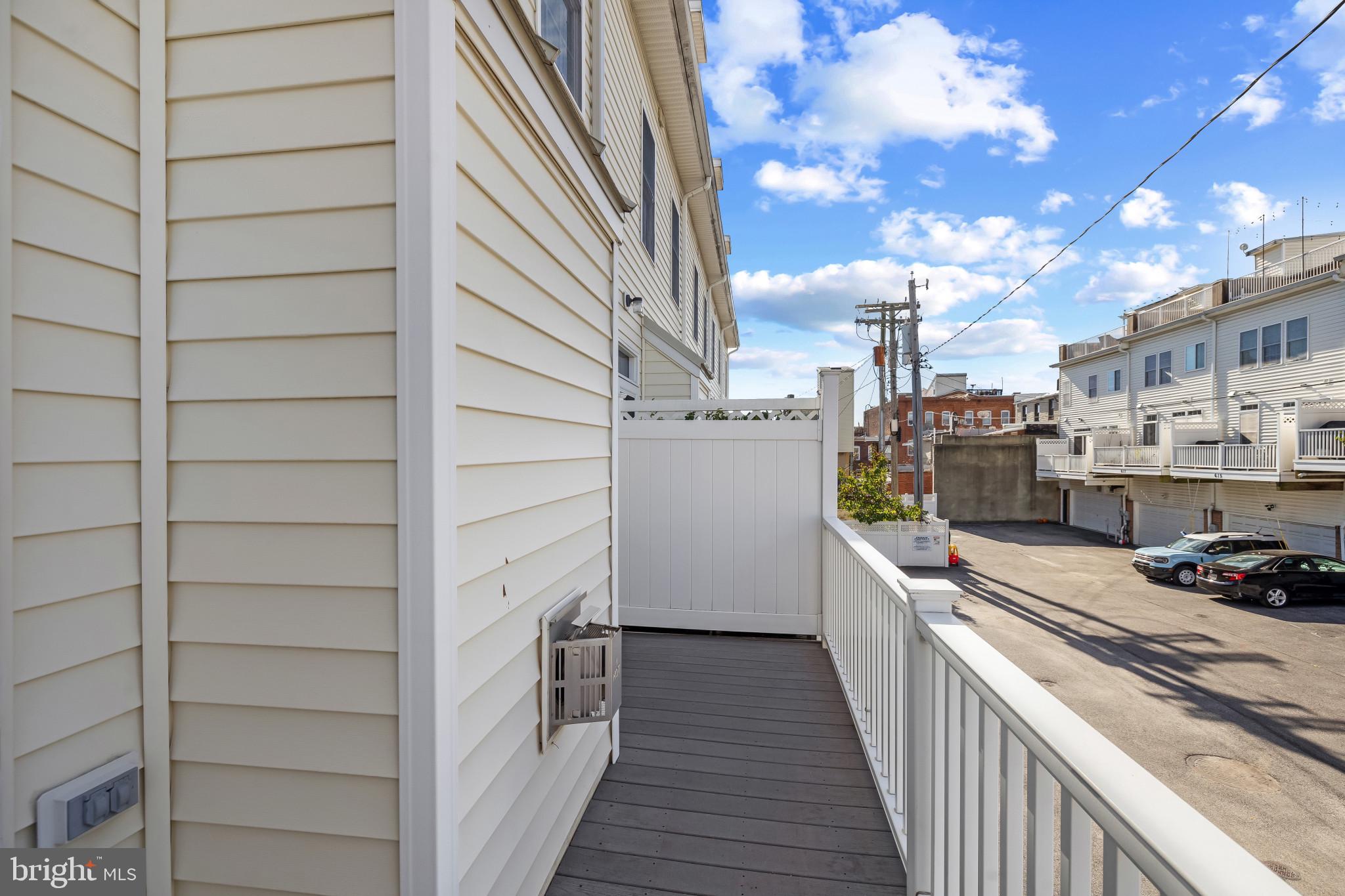 608 South Glover Street Baltimore, MD 21224 - Photo 20 of 41 Rear patio of living room
