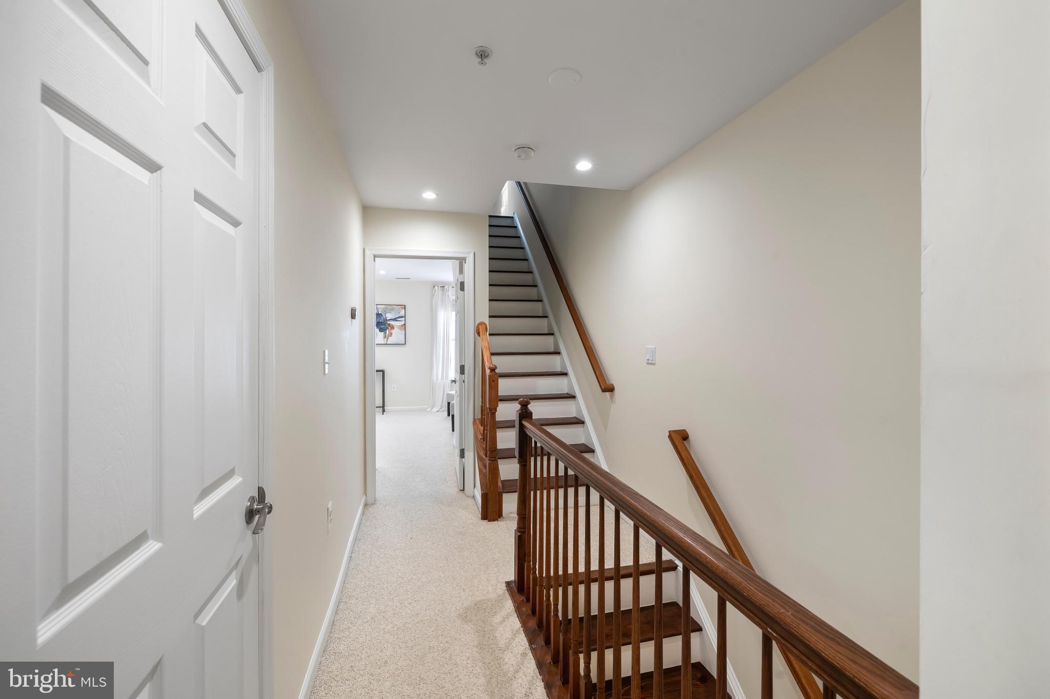 608 South Glover Street Baltimore, MD 21224 - Photo 22 of 41 3rd level interior showing stairs to rooftop deck