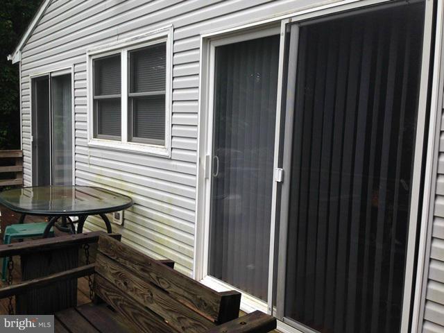 341 Luchase Road Linden, VA 22642 - Photo 17 of 30 a view of a house with backyard and deck