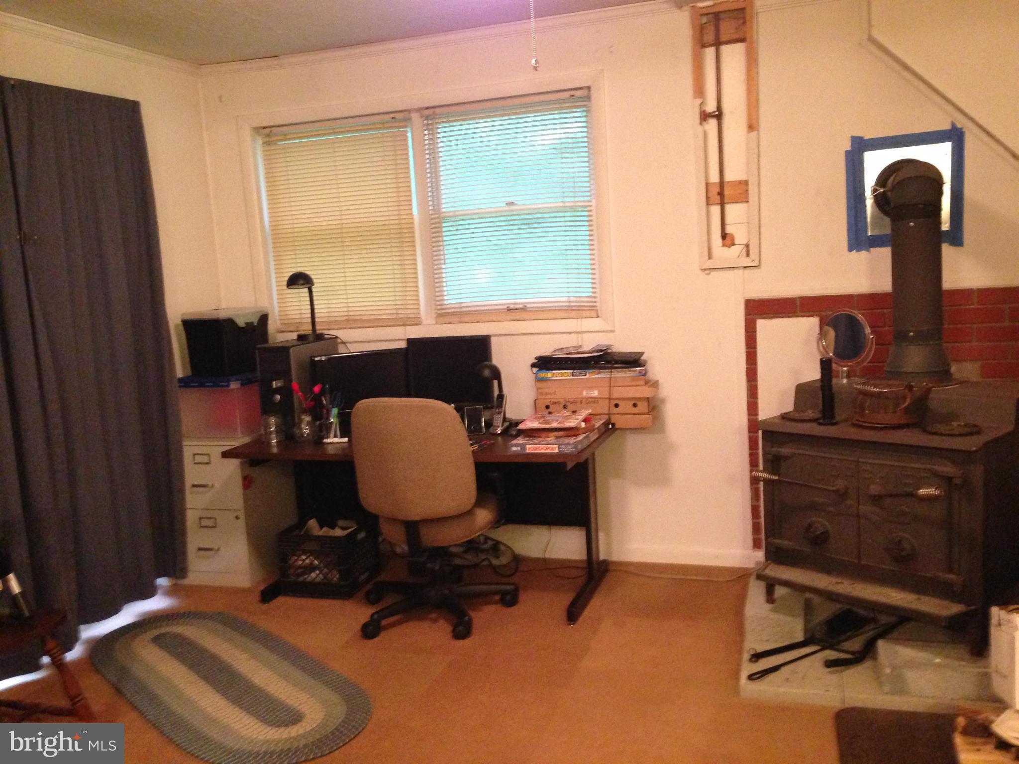 341 Luchase Road Linden, VA 22642 - Photo 20 of 30 a view of a workspace with furniture and a window